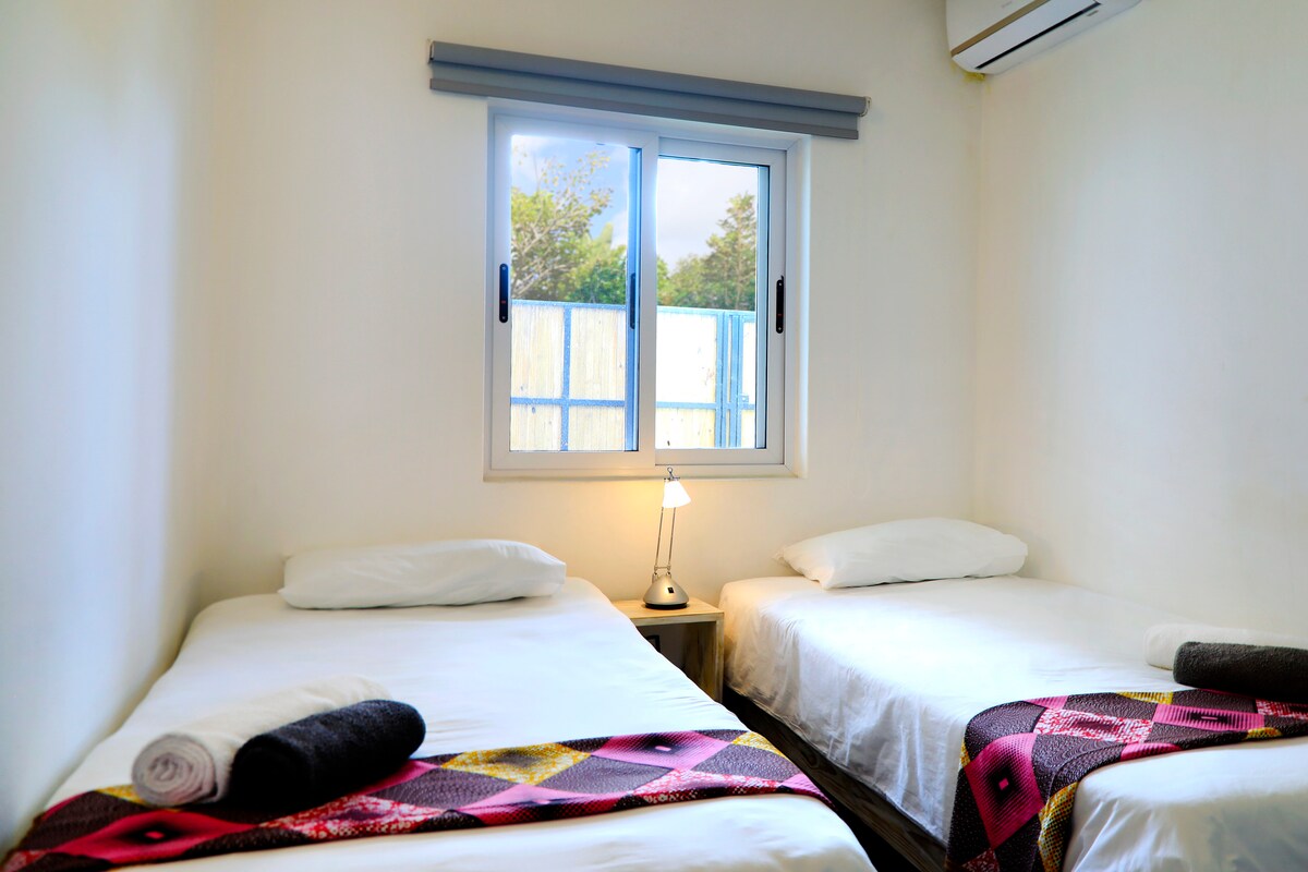 Bedroom 2 with two single beds
